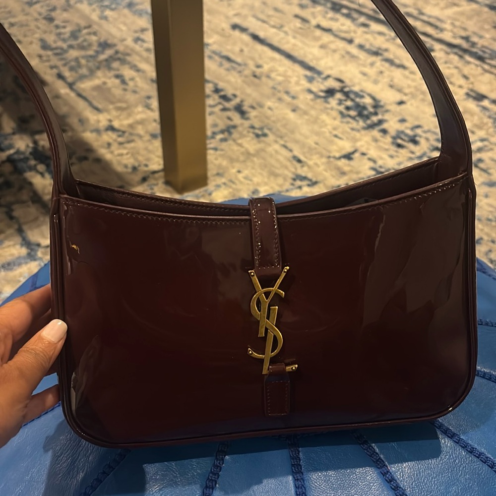 YSL burgundy patent leather shoulder bag in excellent condition with dust bag.